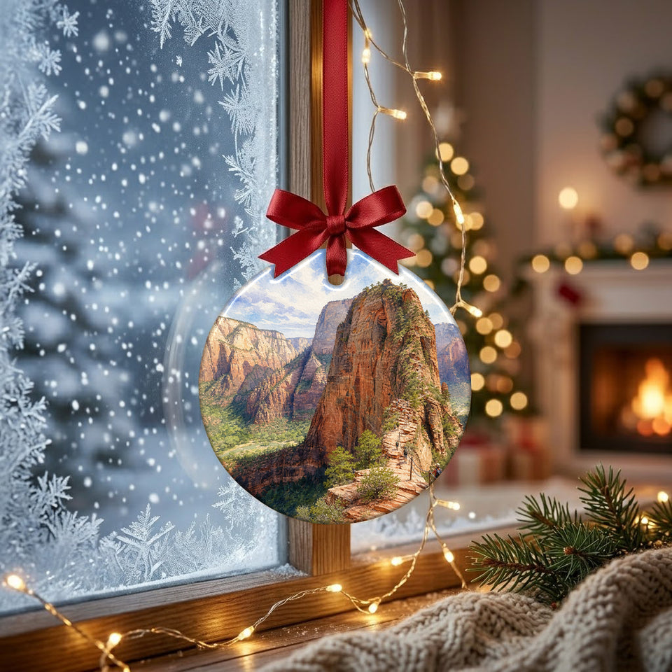 Festive Zion Canyon decoration catching natural daylight while hanging in front of a frosty window.