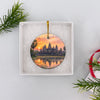 Angkor Wat holiday keepsake packaged neatly inside an opened white gift box ready for gifting.