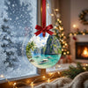 Philippine travel keepsake hanging delicately in front of a frosty winter window in daylight.