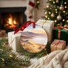 Round desert ceramic keepsake arranged next to wrapped holiday gifts beside a cozy fireplace.
