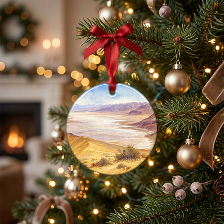 California travel keepsake resting on a rustic holiday table surrounded by seasonal pinecones.