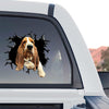 Detailed Basset Hound decal proudly displayed on the rear window of a truck.