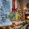 Malaysian landmark keepsake displayed hanging by a frosty winter window in daylight