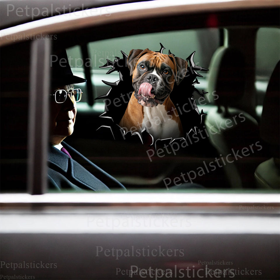 Playful Boxer dog cracked glass decal applied seamlessly to a black car door panel.