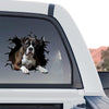 Clear vinyl graphic sticker applied to the rear window of a truck outdoors.