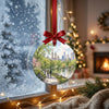 New York park keepsake ornament suspended in front of a frosty winter window catching soft daylight.
