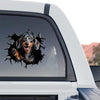 Funny Dachshund broken window sticker applied to the rear window of a truck.