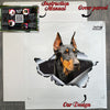 Unopened cardboard package containing the Doberman vinyl decal and instructions.