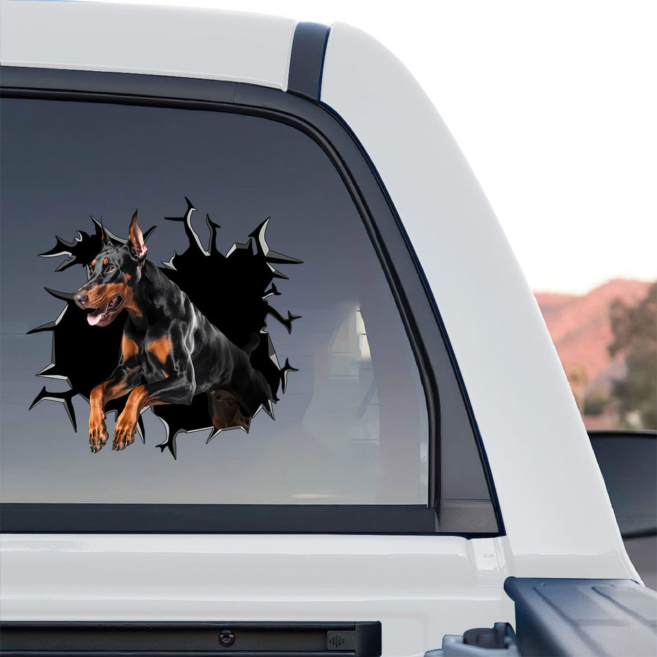 Clear vinyl Doberman graphic applied to the rear glass of a truck.