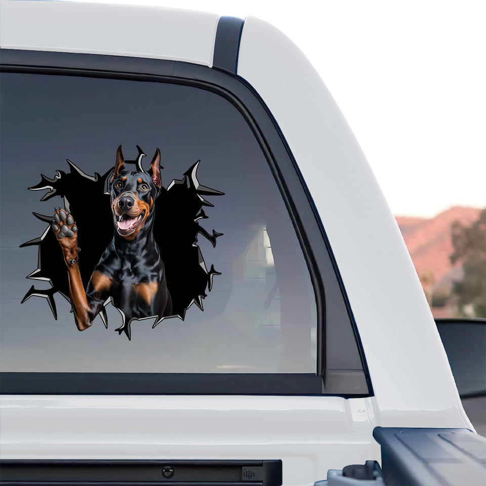 Vibrant Doberman Pinscher sticker styled on the rear window of a truck.