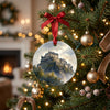Holiday ornament featuring Edinburgh Castle hanging gracefully from a festive Christmas tree branch.
