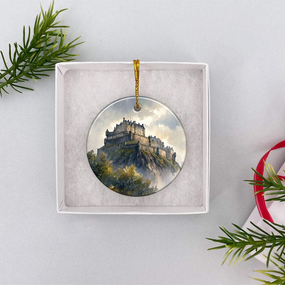 Ceramic holiday ornament nestled carefully inside an open white gift box ready for gifting.