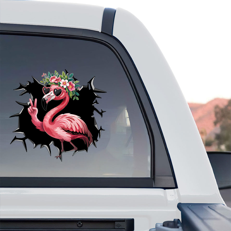 Colorful tropical flamingo decal applied to the rear window of a truck.