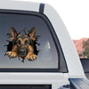 Proud German Shepherd graphic decal adhered to the rear window of a pickup truck.