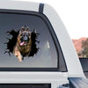 Outdoor rear window of a truck showing an eye-catching German Shepherd vinyl decal.