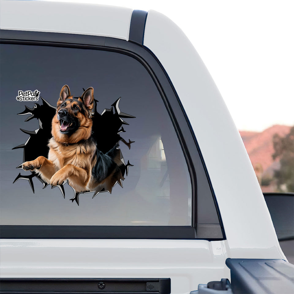 Eye-catching German Shepherd broken glass graphic decal displayed on the back window of a truck.