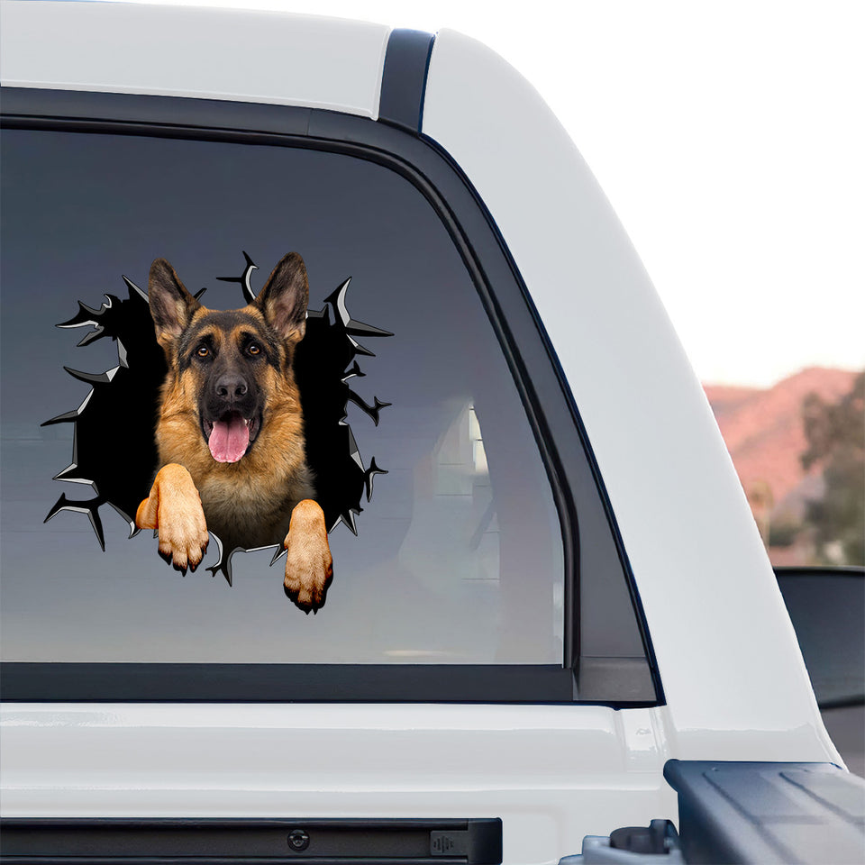 Clear vinyl German Shepherd On Board sticker placed on the rear glass of a truck.