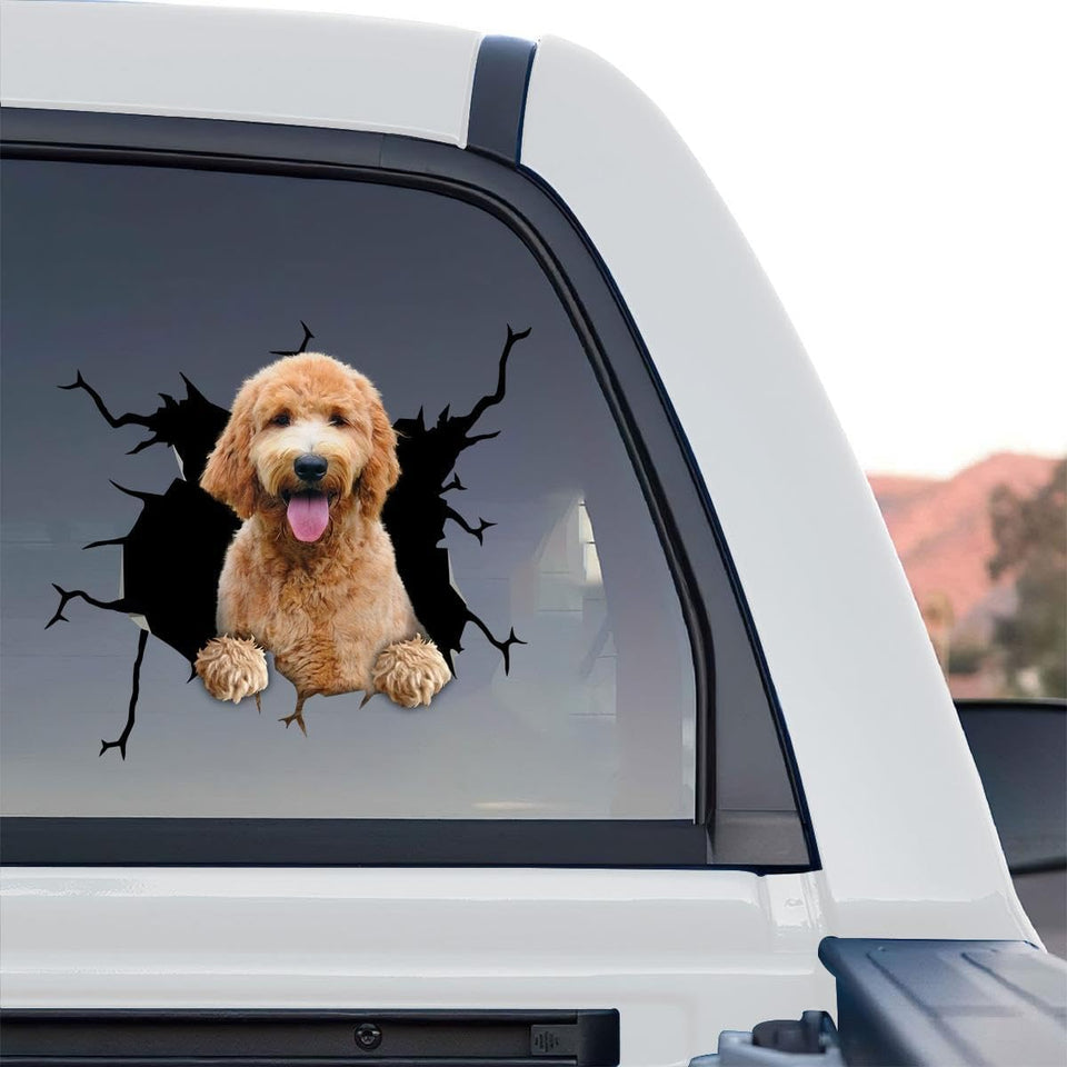 Goldendoodle sticker standalone product design showing a smiling pup bursting through a cracked graphic.