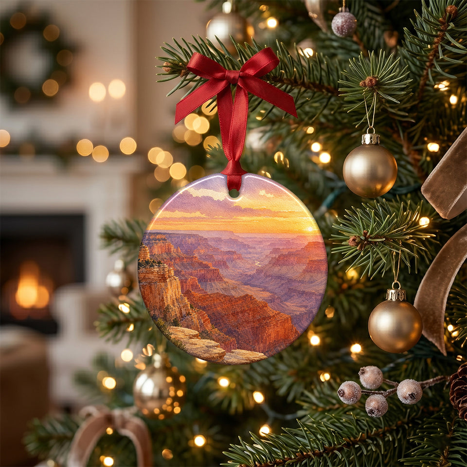 Ceramic Grand Canyon holiday ornament hanging gracefully from an illuminated Christmas tree branch.