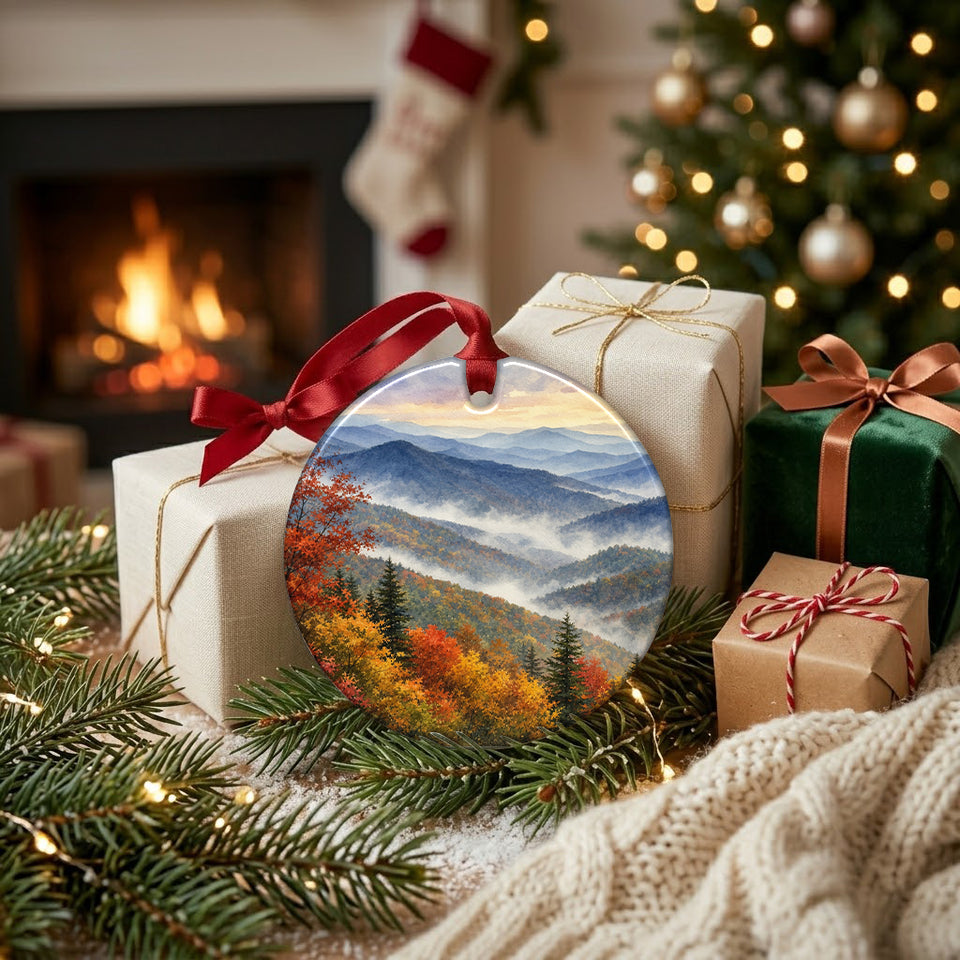 Ceramic Smoky Mountains keepsake placed beside wrapped holiday gifts near a glowing hearth.