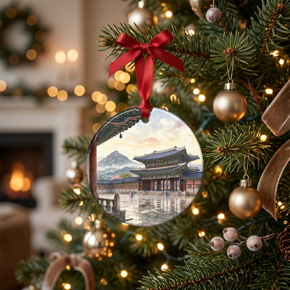 Seoul landmark ceramic ornament hanging gracefully from an illuminated Christmas tree branch.