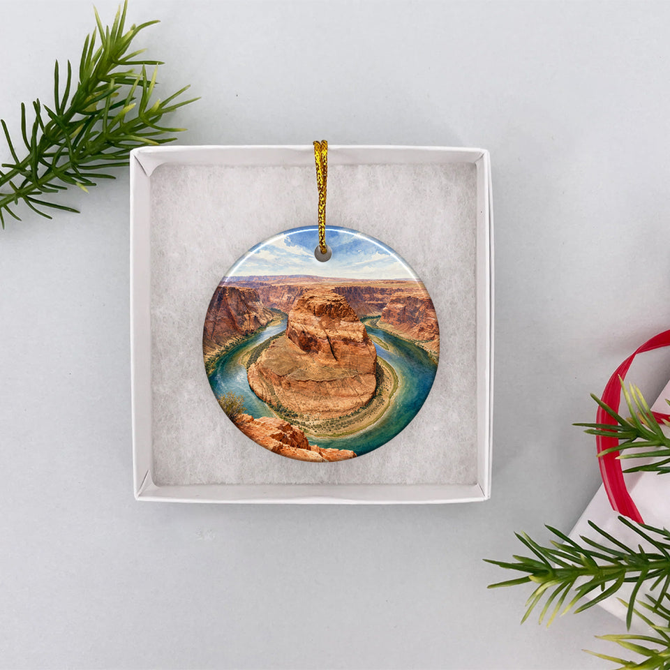 Round Arizona ceramic keepsake presented inside an open white gift box.