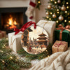 Nepal landmark ornament nestled beside wrapped holiday gifts in front of a warm fireplace.