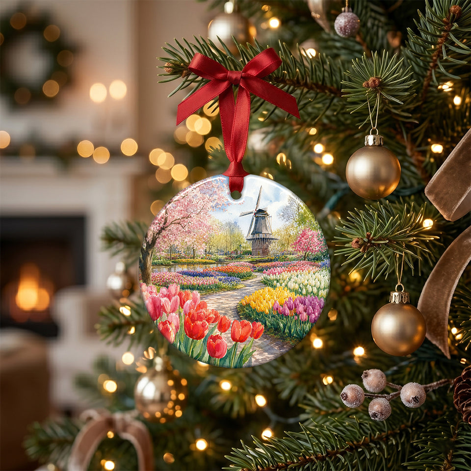 Dutch tulip garden holiday ornament hanging from an illuminated branch of a decorated Christmas tree.