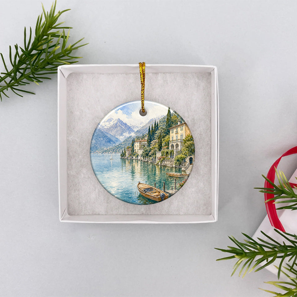 Festive travel ornament neatly presented inside an open white gift box ready for gifting.
