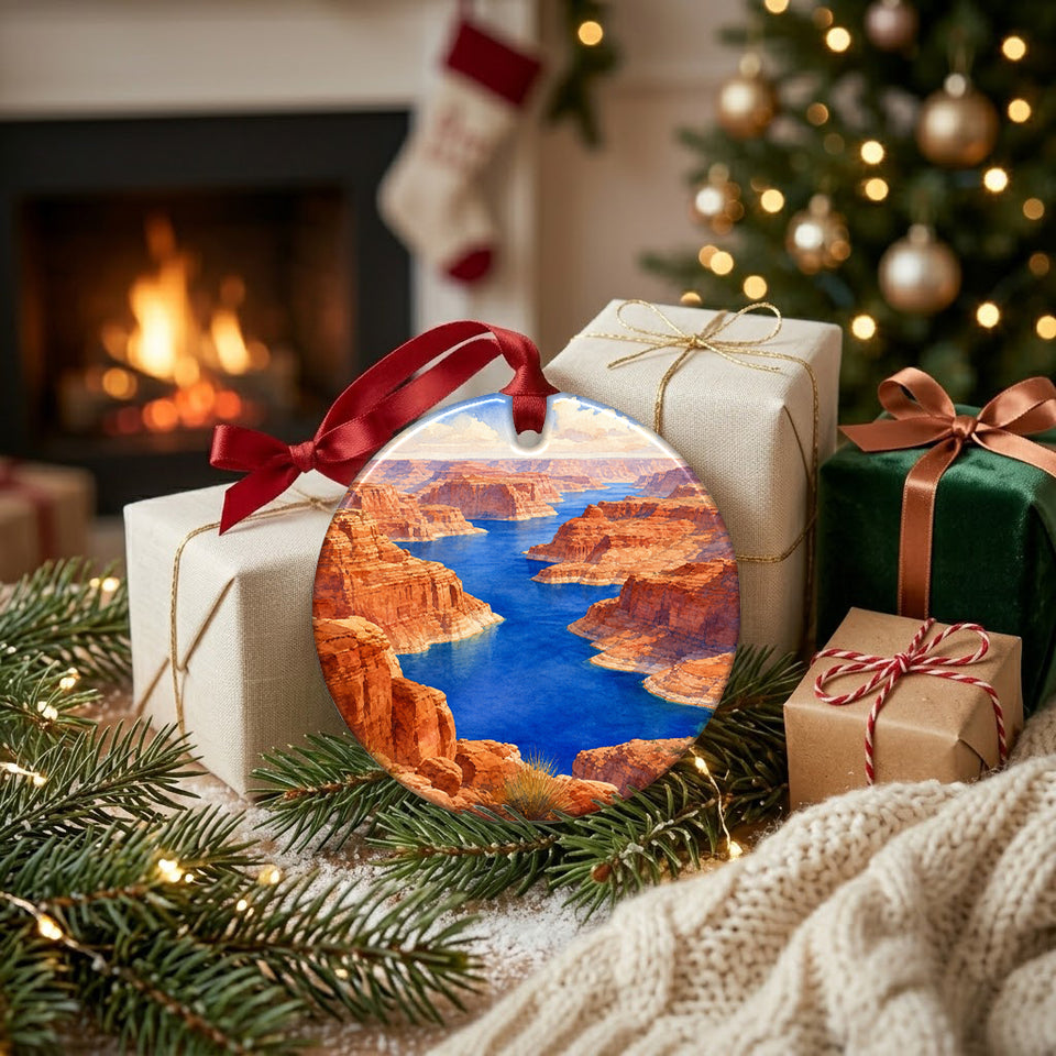 Southwest canyon ornament displayed beside wrapped holiday gifts in front of a glowing fireplace.