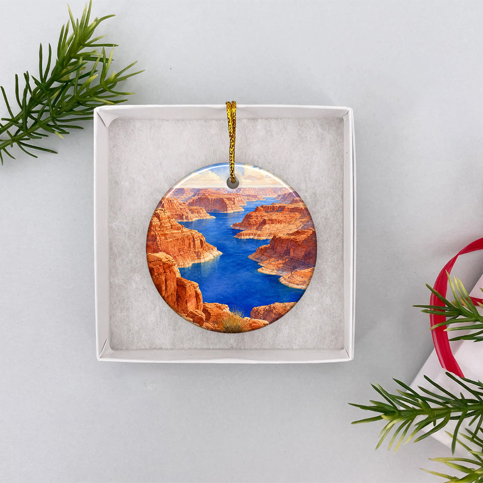 Round ceramic Lake Powell keepsake nestled inside an opened white gift box ready for holiday gifting.