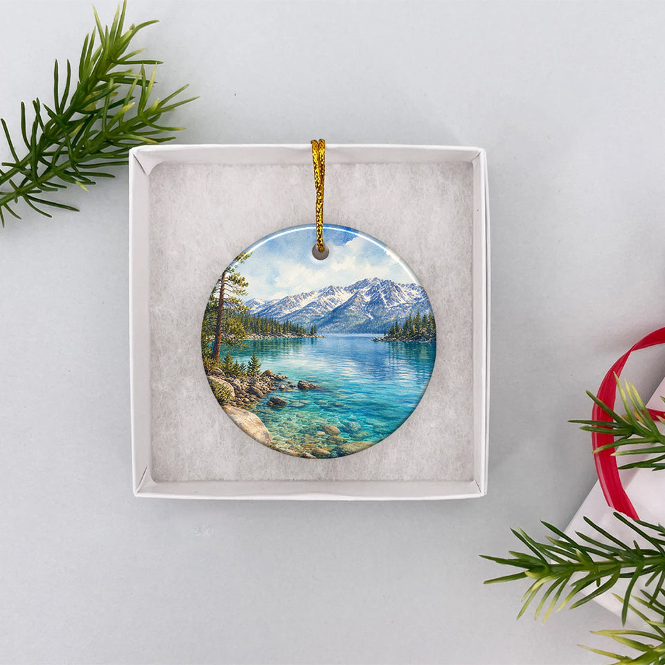 Ceramic travel ornament nestled carefully inside an open white gift box ready for holiday gifting.