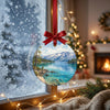 Scenic lake ornament catching soft natural winter daylight in front of a frosty window pane.