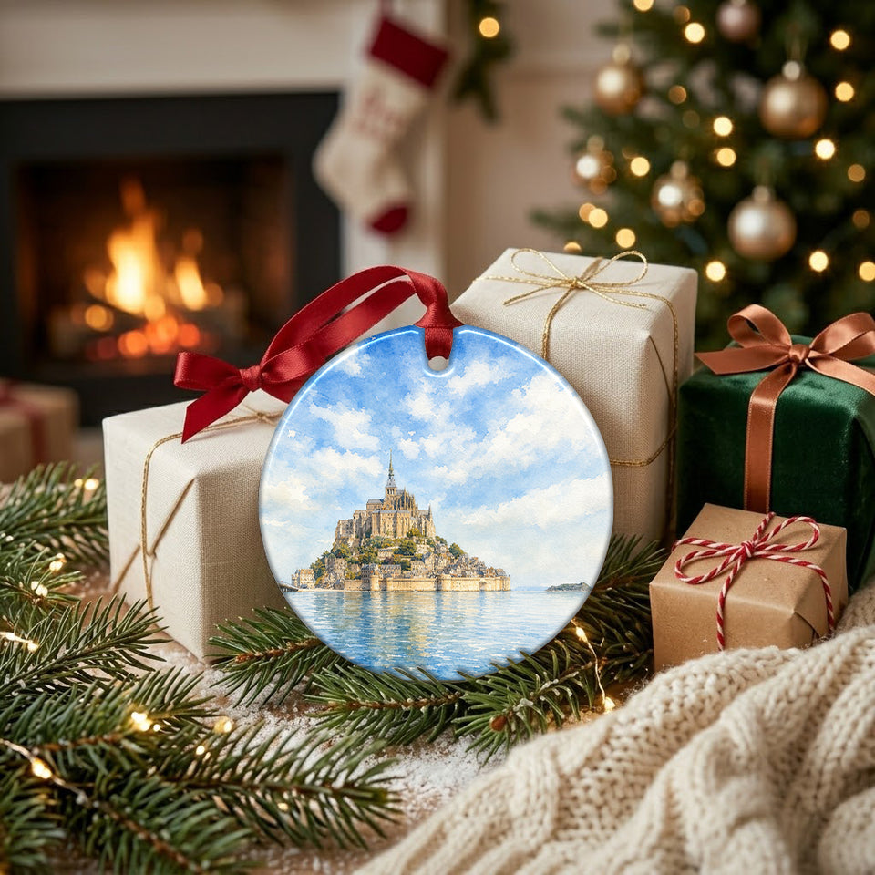 Normandy travel souvenir placed next to wrapped gifts beside a warm hearth.