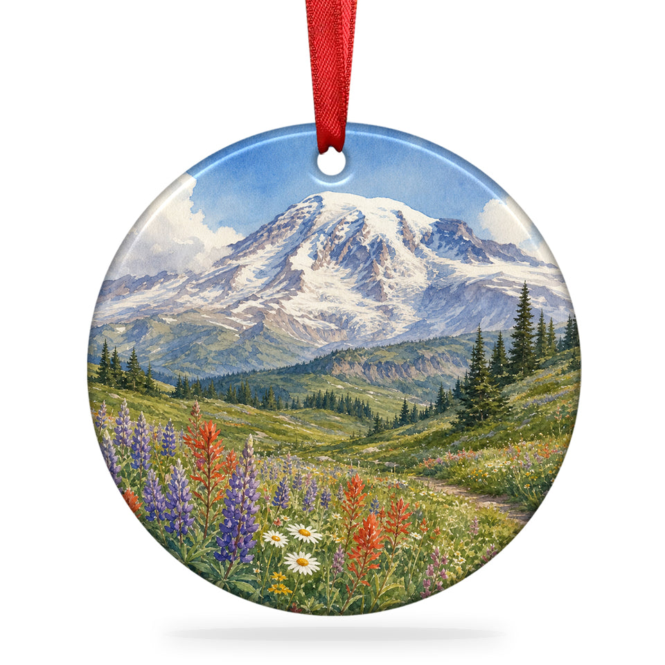 Mount Rainier ceramic holiday decoration shown against a clean white background with hanging ribbon.