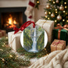 Ceramic keepsake resting near wrapped holiday gifts beside the warmth of a glowing fireplace.