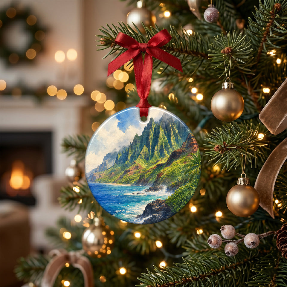 Ceramic Kauai ornament hanging among glowing holiday lights on a Christmas tree branch.