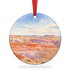 Painted Desert ceramic holiday ornament displayed over a clean white background.