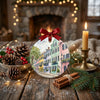 Festive Charleston souvenir placed on a rustic table next to natural pinecone accents and candlelight.