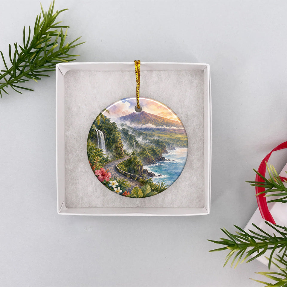 Hawaiian volcanic landscape ornament nestled inside an open white gift box packaging.
