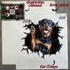 Unboxed Rottweiler car decal displayed with its protective retail package.