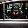 Stunning Rottweiler vinyl sticker applied neatly onto a dark glossy car door.