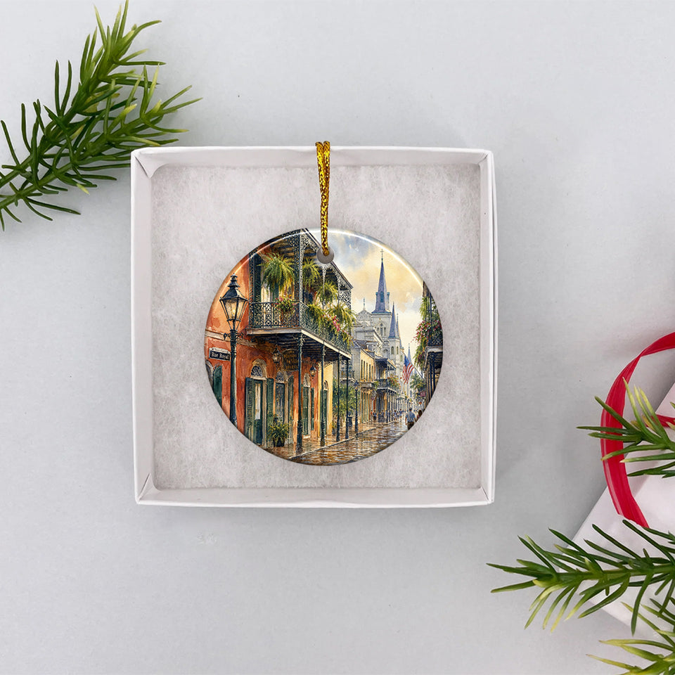 Ceramic travel keepsake neatly packaged inside an opened white gift box ready for holiday gifting