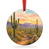 Saguaro National Park ceramic ornament shown on a plain white background with hanging ribbon.