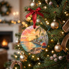 Key West buoy ceramic ornament hanging gracefully on a lit Christmas tree branch surrounded by holiday lights.