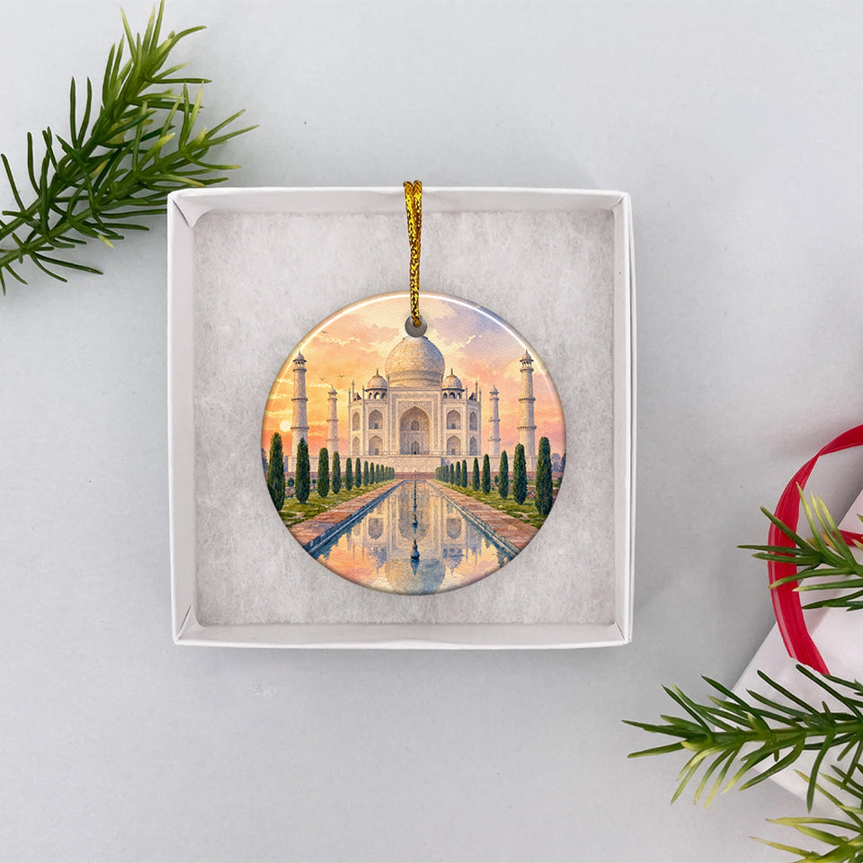 Round Taj Mahal ceramic decoration packaged carefully inside an opened white gift box.
