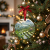Ceramic Bali holiday keepsake hanging gracefully from an illuminated Christmas tree branch.