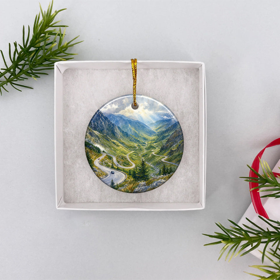 Transfăgărășan road keepsake presented securely nestled inside an opened white gift box ready for gifting.
