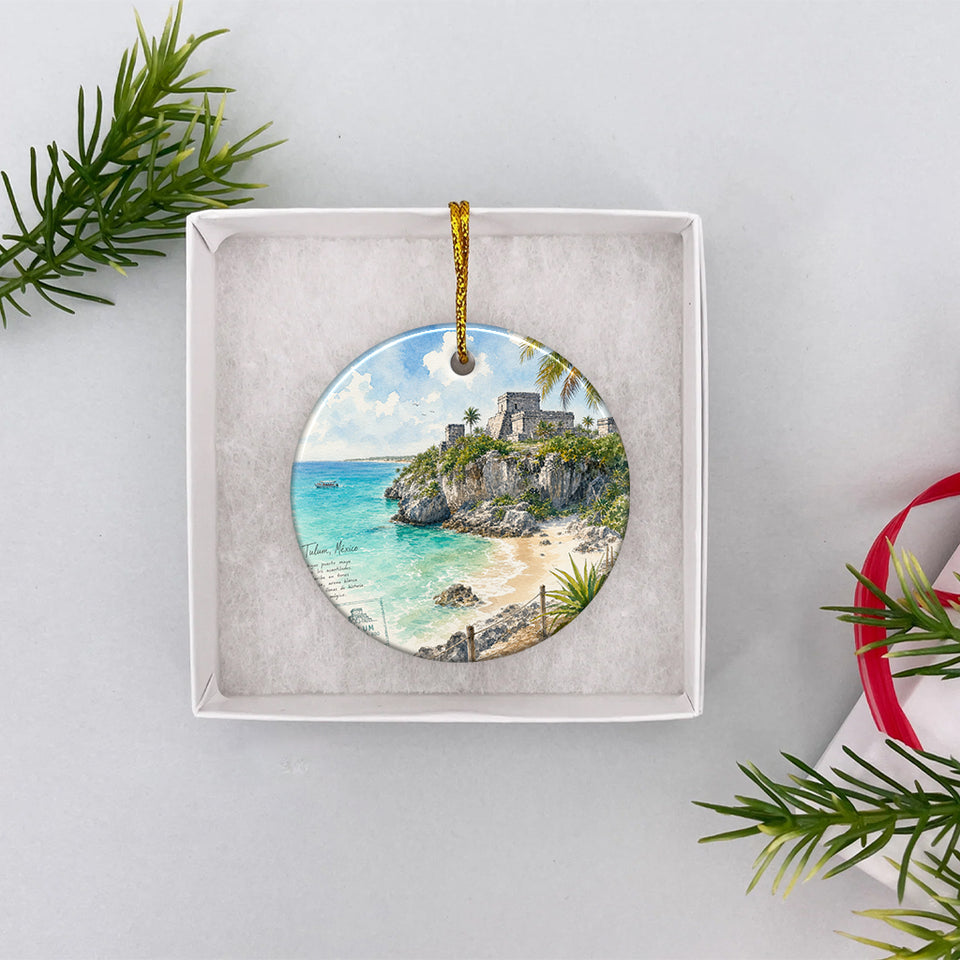 Tulum travel keepsake ornament resting securely inside an open white gift box ready for holiday giving.