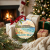 Ceramic Hawaii keepsake placed next to wrapped holiday gifts near a cozy fireplace.